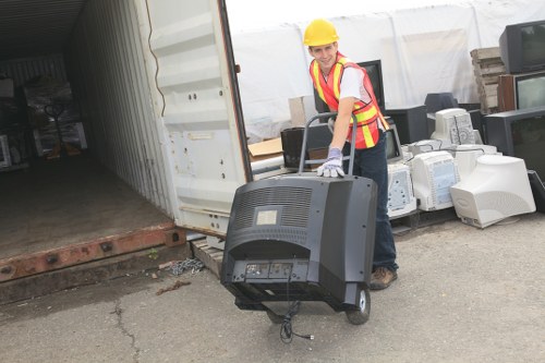 Professional team clearing garage items